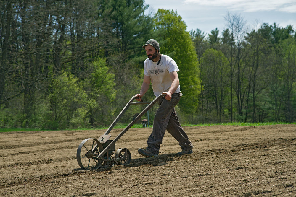 Mike Planting with 100 Year Old Machine